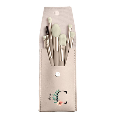 Beige PU leather makeup brush bag with flower design and 8 makeup brushes, a personalized gift for her.