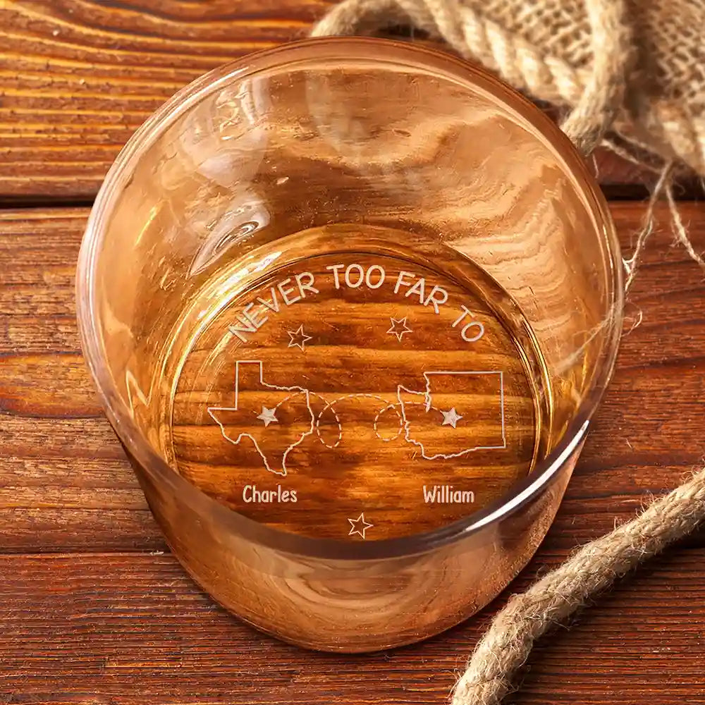 Personalized whiskey glass with "Never Too Far To Drink Together" engraving, a perfect gift for friends and family.