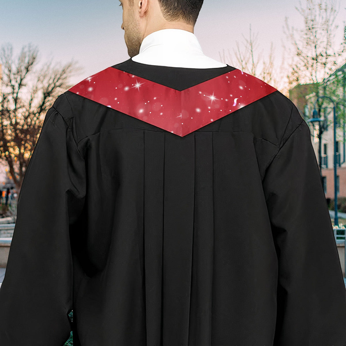 Red graduation stole with text on a black graduation gown. Satin/polyester blend graduation stole for graduation.