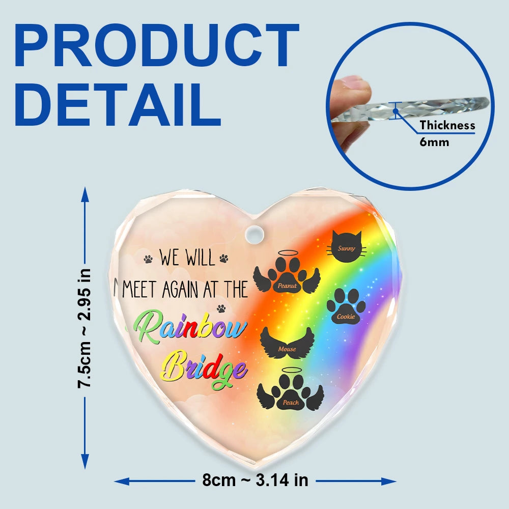 Personalized heart-shaped glass pet memorial ornament product detail with dimensions, text, and paw prints.