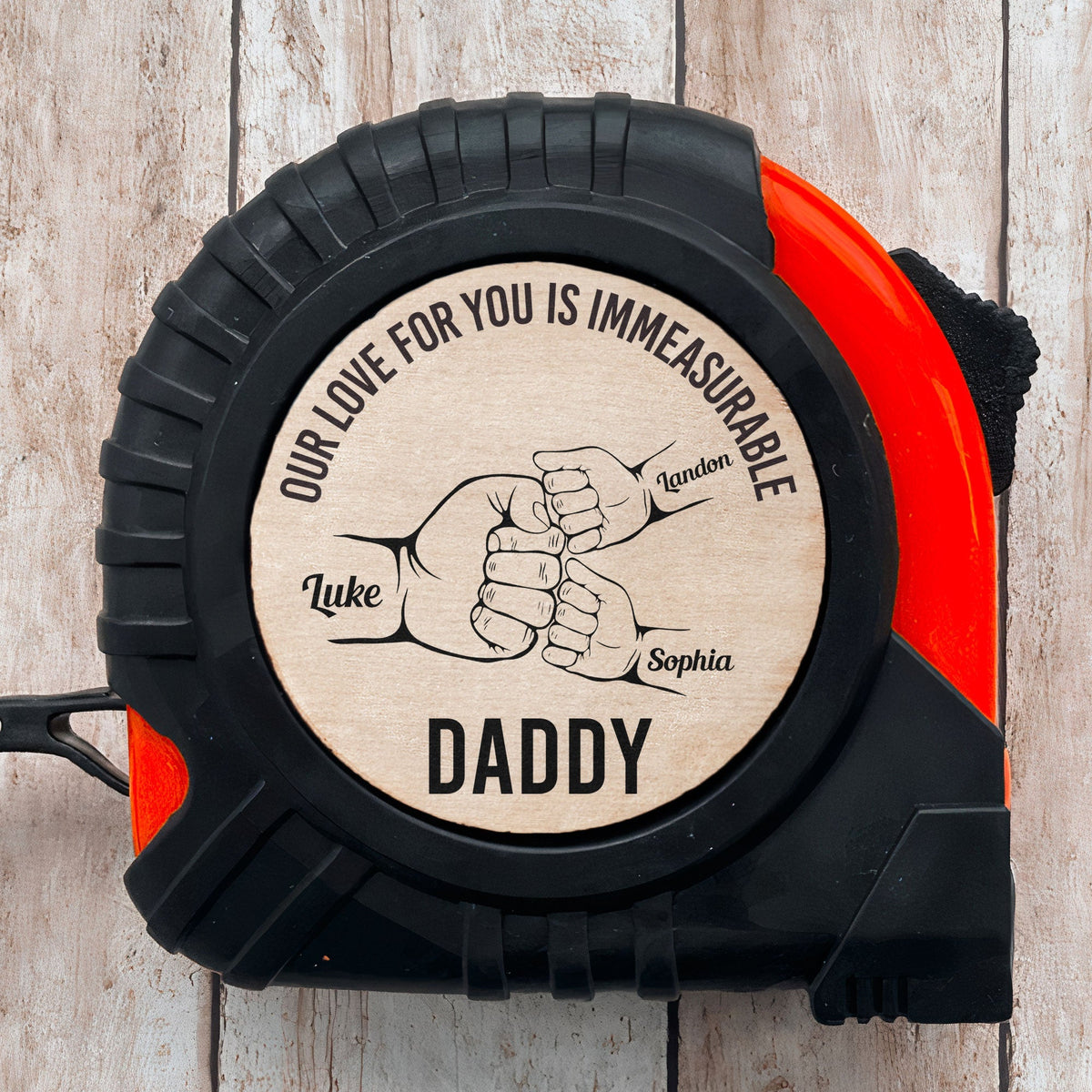 Personalized tape measure with "Our love for you is immeasurable" message, a perfect Father's Day gift.